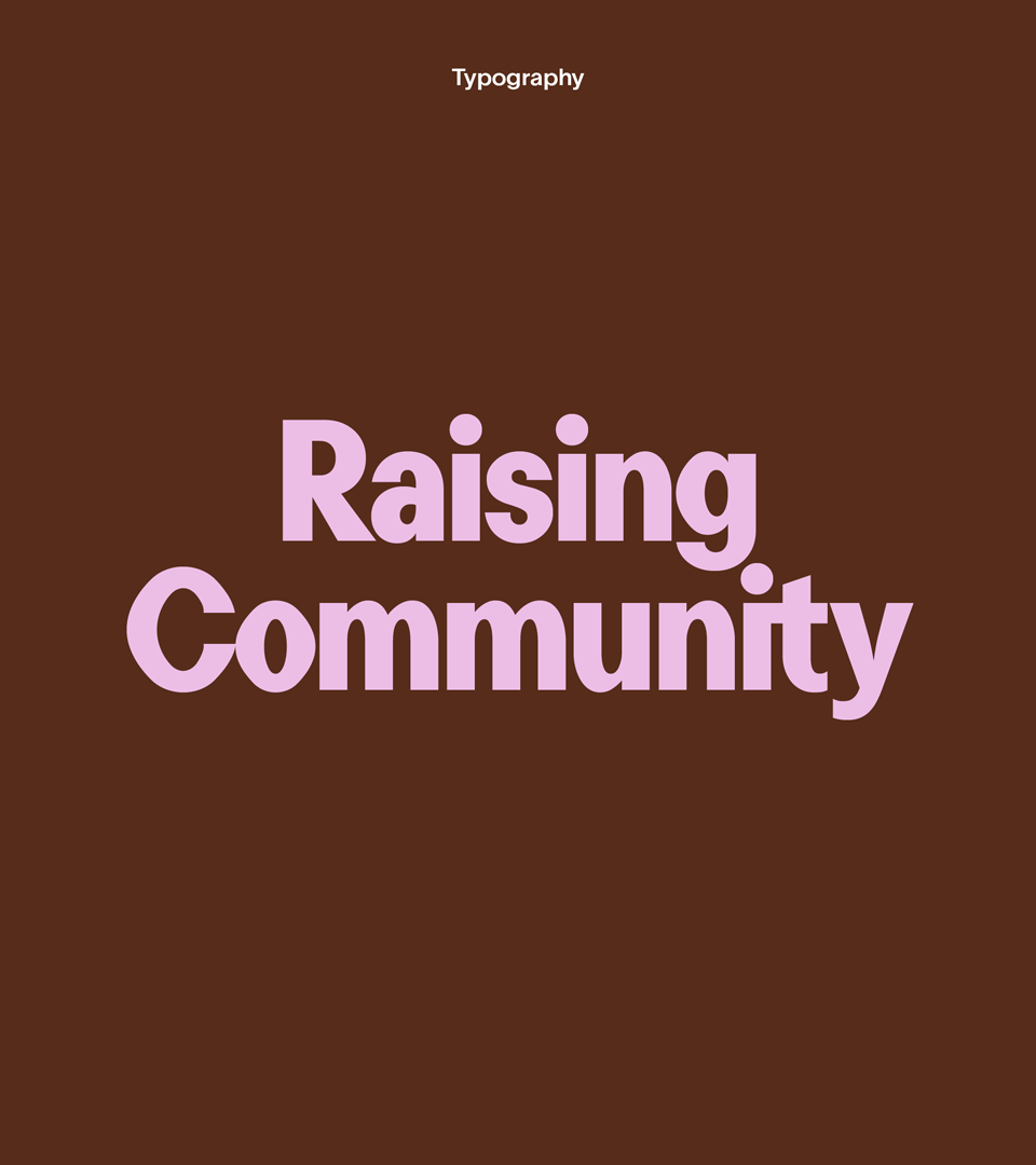 Pink lettering on Brown, reads raising community