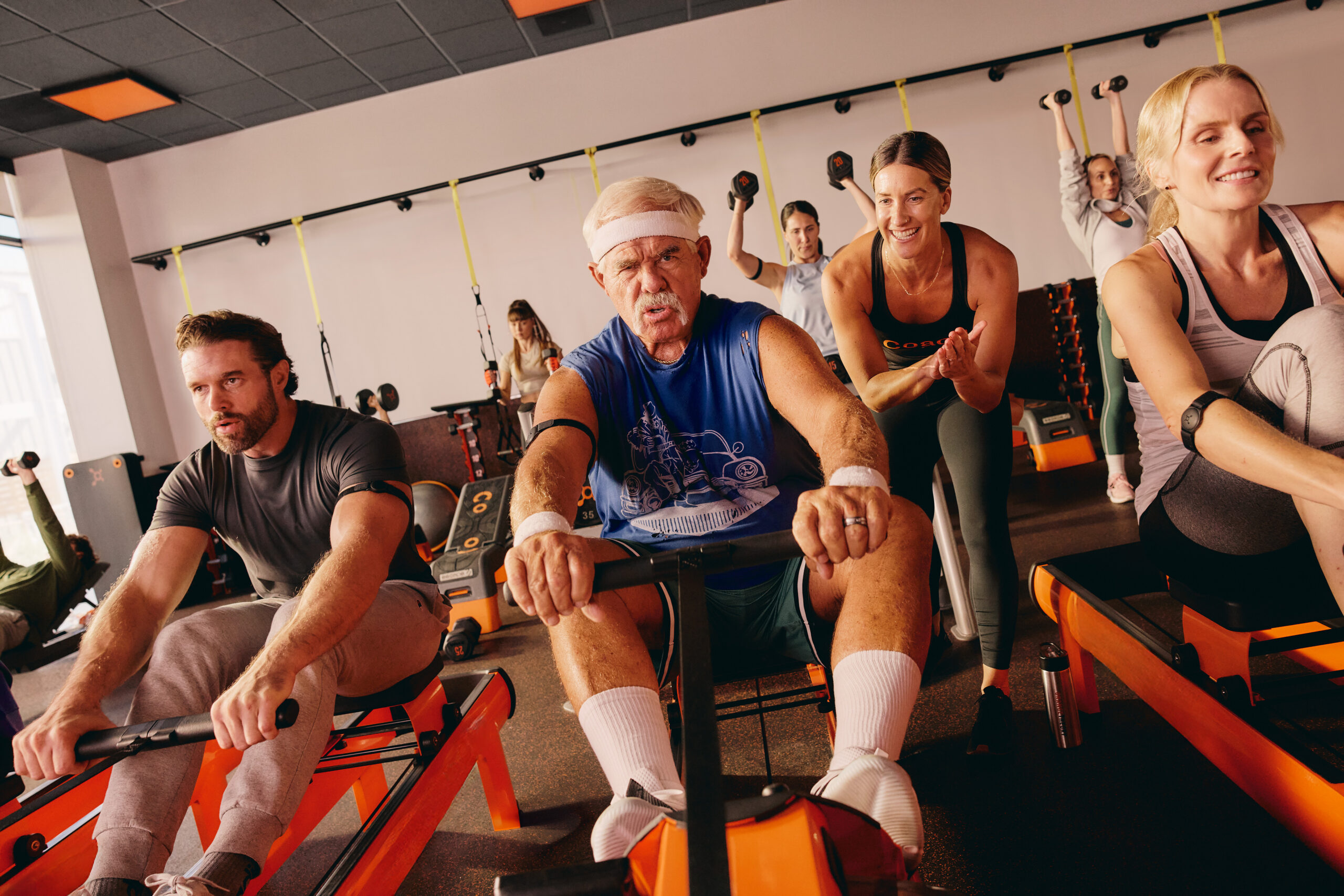 Older man on a rowing machine